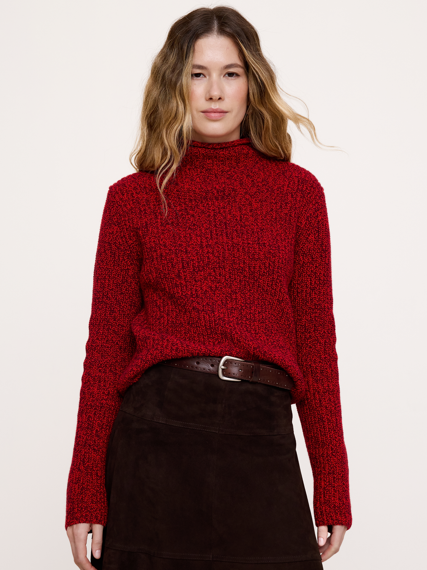 Image 1 of 4, Cozy up to this classic sweater. It's got Merino wool for warmth and cotton for breathability. Bonus: makes a great gift (even to yourself!), Fitted: Slim. Sits close to the body., Roll funnel neck., Straight hem., Product #1195897