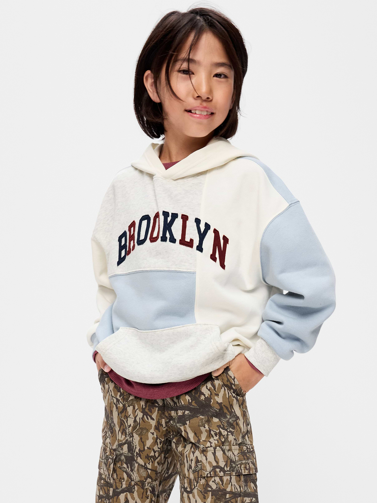 Image 1 of 1, built-in hood, long sleeves, drop shoulders, kangaroo pocket, banded hem, Product #1182355