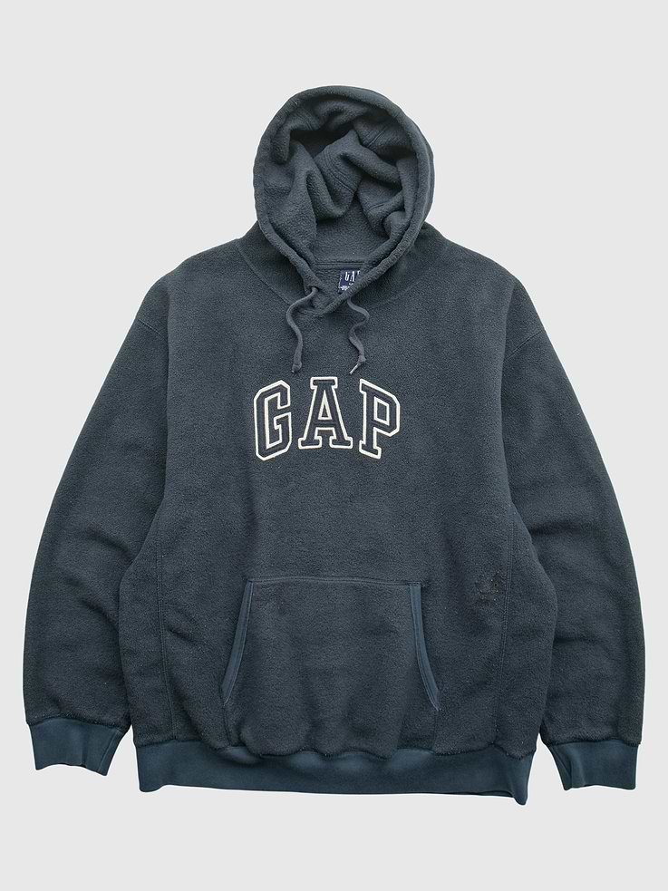 Image 1 of 2, One-of-one vintage piece sourced by Gap. Originally made in 2000s. Tag size listed as Unisex L. Chest Width: 25.5 in. Body Length: 27.5 in. Fits like a modern size L. Sizing may vary. Condition: Light wear. Small hole and distressing near pocket. Online only. Item cannot be returned or exchanged. Specifications: Vintage Laundered Final Sale