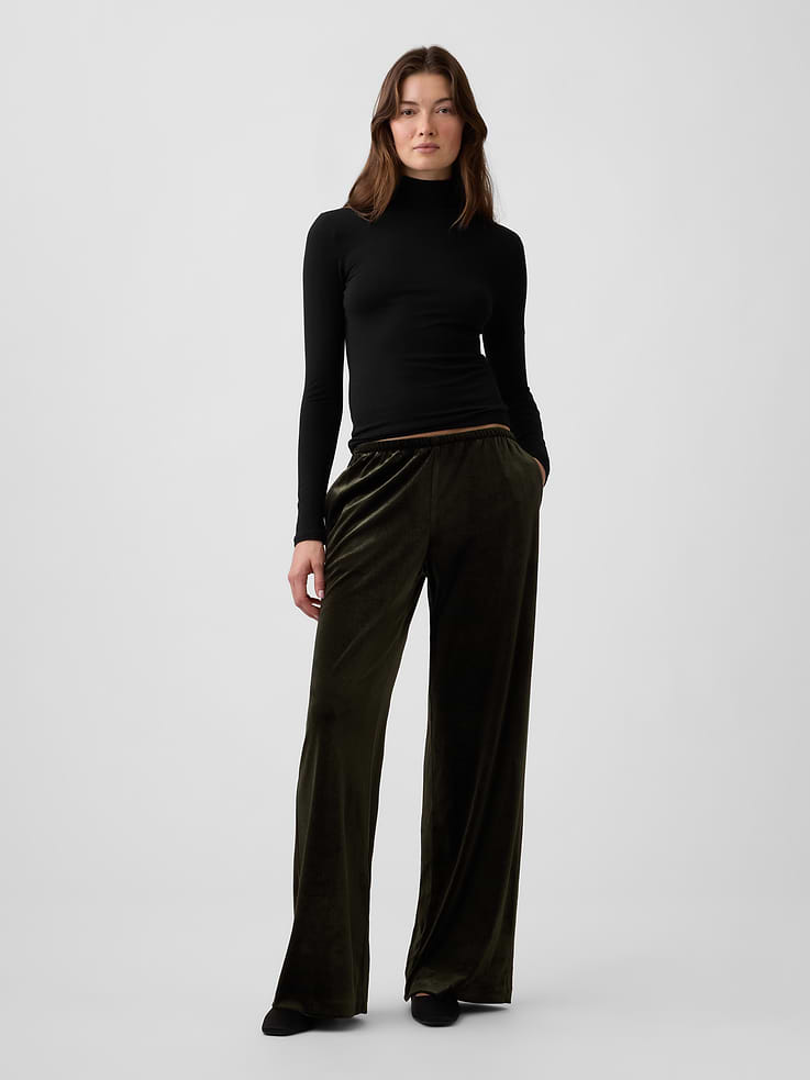 Image 1 of 7, This product is made with/contains 90% recycled polyester. Compared to virgin materials, using recycled materials helps reduce resource use and waste., Stretch velour knit., Elasticized waist., On-seam pockets., This product was made in a factory that invests in gender equity and women’s empowerment through RISE. Learn more at, Product #1185222