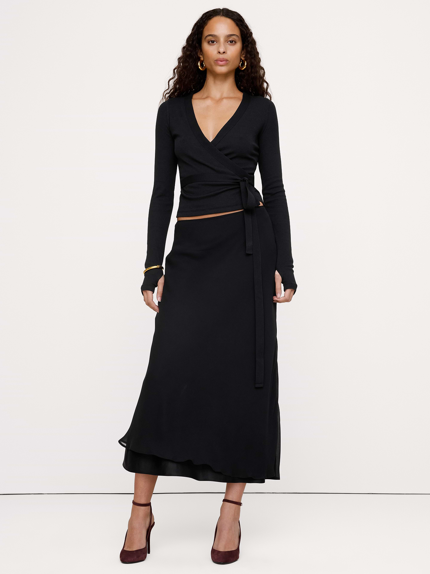 Image 1 of 3, Living your prima ballerina dreams. This cute wrap top is cut from our stretchy ribbed jersey, which mixes cotton and modal for an even-softer handfeel., Fitted: Slim. Sits close to the body., Low V-neck with wrap tie., Straight hem., Product #1183307