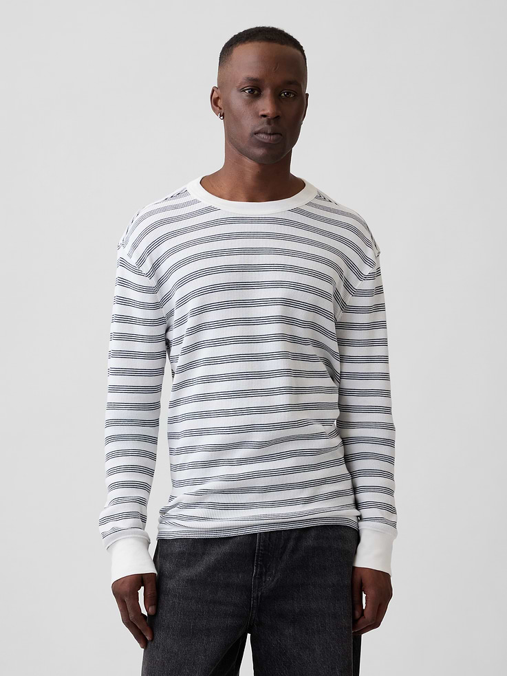 Image 1 of 5, Sof waffle knit., Long sleeves with banded cuffs., Crewneck., Allover stripes., This product was made in a factory that invests in gender equity and women’s empowerment through RISE. Learn more at, Product #1195154