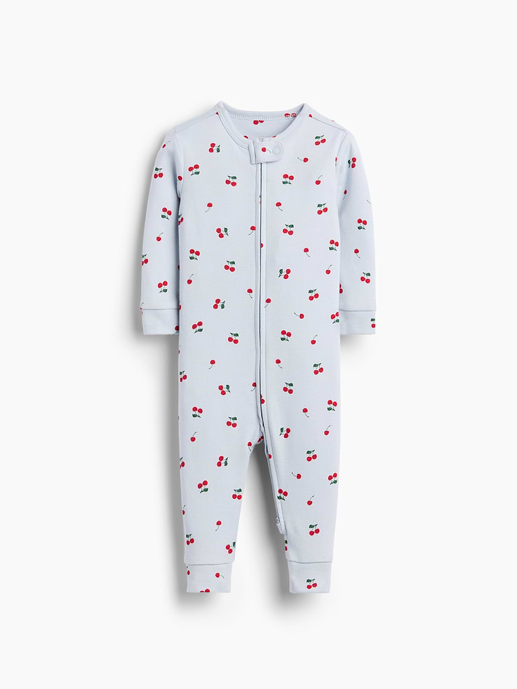 Image 1 of 3, Soft cotton jersey baby one-piece., Crewneck with snap tab to protect little chins., Long sleeves with foldover cuffs to prevent scratches., Reversible two-way zipper for easy dressing and diapering., Banded cuffs., Made with 100% organically grown cotton which is grown without the use of synthetic pesticides and fertilizers., Shop matching PJs for all., This product was made in a factory that invests in gender equity and women’s empowerment through RISE. Learn more at gapinc.com/equity ., Product #915915