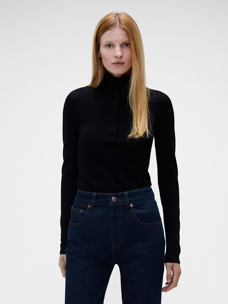 Image 1 of 6, Soft Merino wool sweater. In a slim fit., Turtleneck with button detailing., Long sleeves., Ribbed hem and cuffs., This product contains 100% RWS-certified wool, certified by Control Union (CU 893801), which verifies animal welfare and land management requirements and tracks the certified wool fiber from farm to final product., This product was made in a factory that invests in gender equity and women’s empowerment through RISE. Learn more at gapinc.com/equity ., Product #1183572
