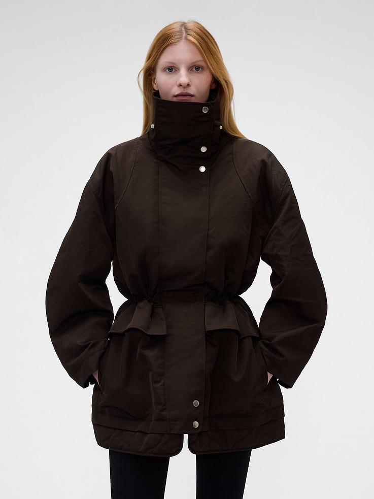 Image 1 of 9, Wind-resistant and water-repellent crinkle nylon twill parka jacket., Quilted taffeta lining., High neck., Long sleeves with dropped shoulders., Hidden zipper under snap button closure., Cinch cord at waist., Flap pockets., Double layered hem., Product #1185645