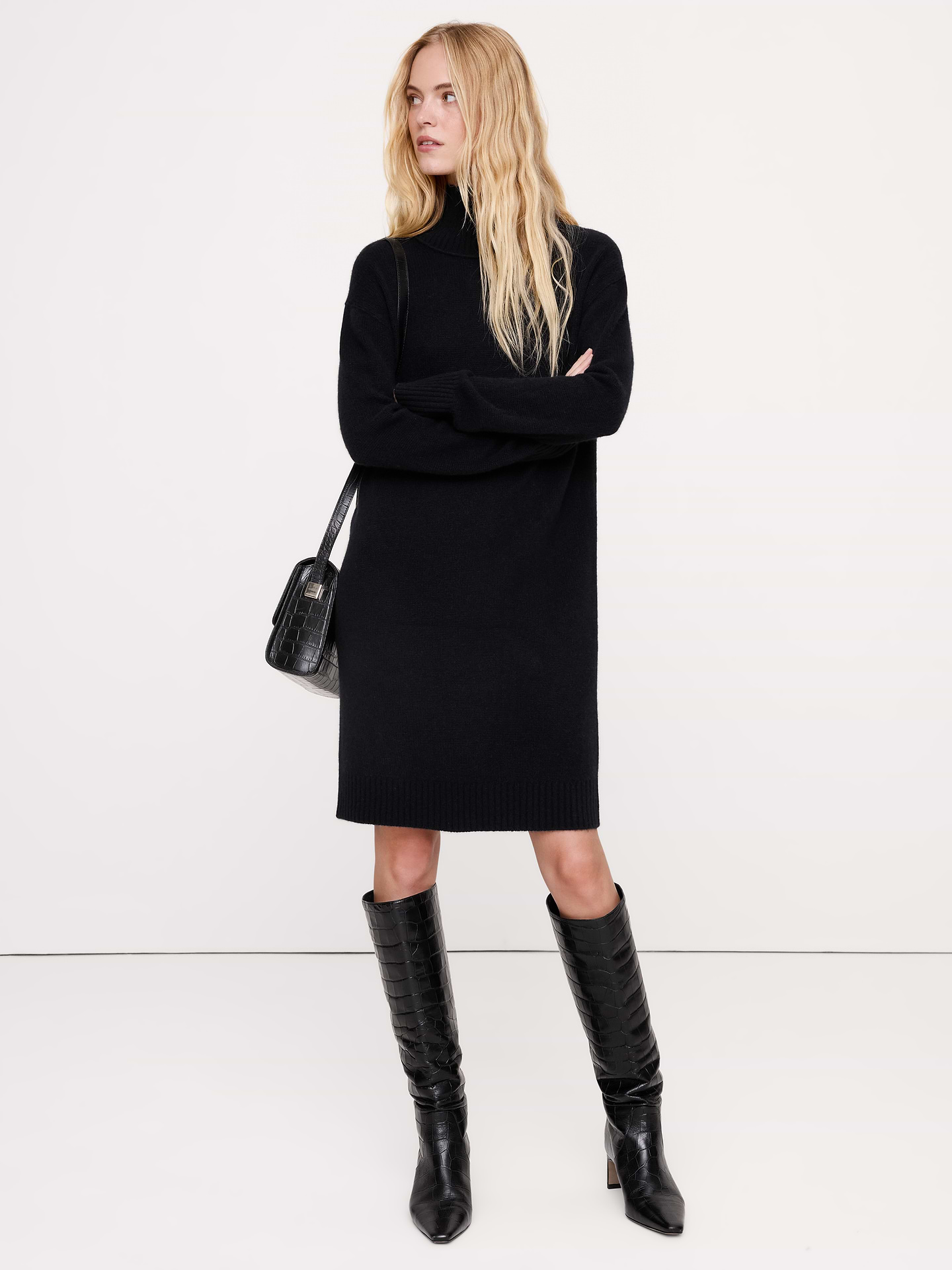 Image 1 of 3, The vibe is lightweight luxury. This cashmere sweater dress has a relaxed fit, knitted in our lightweight cashmere yarn—selected for its softness and all-season weight., Shift fit: Relaxed shoulders, straight through bust, waist and hip with a straight skirt., Turtleneck., Pull-on design., Unlined., Product #1182095