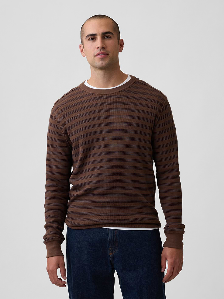Image 1 of 5, Sof waffle knit., Long sleeves with banded cuffs., Crewneck., Allover stripes., This product was made in a factory that invests in gender equity and women’s empowerment through RISE. Learn more at, Product #1195154
