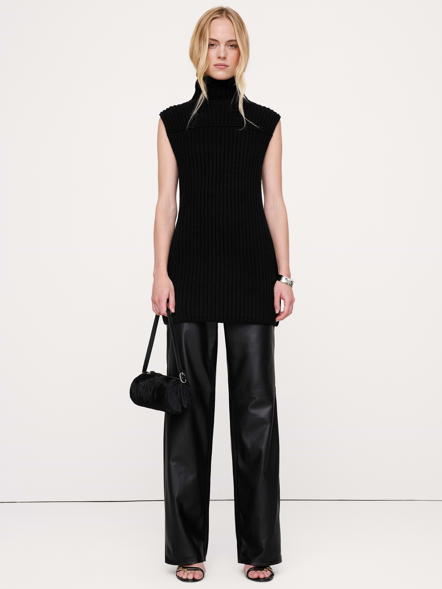Image 1 of 3, So soft, so luxe, we kept the fit loose for this modern mock-neck sweater tank, knit in a warm blend of extra-fine Merino wool from Italy. Here, the yarn is plaited to create a two-tone ribbed effect., Relaxed Fit: A straight & roomy fit., Fabric from Italy's Filpucci mill., Mock neck., Straight hem., Product #1184642