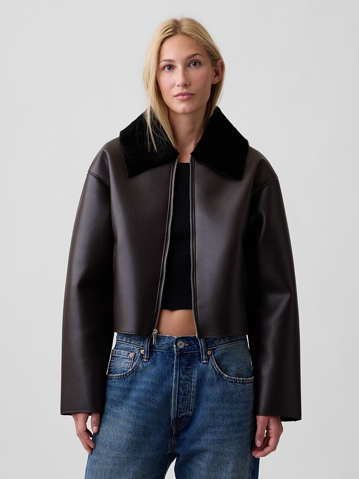 Image 1 of 5, Smooth faux leather., Interior faux-fur bonding/lining., Dropped shoulder, long sleeves., Faux-fur spread collar, zip front., Front slant pockets., This product was made in a factory that invests in gender equity and women’s empowerment through RISE. Learn more at, Product #1185213