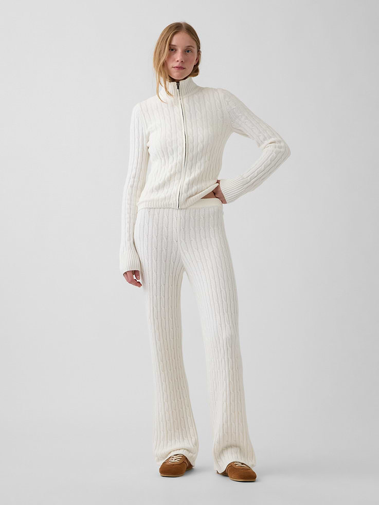 Image 1 of 6, Supersoft cable-knit cotton-blend sweater pants. In a relaxed fit., Elasticized waist., Ribbed hem., Explore the Gap Gift Shop ., This product was made in a factory that invests in gender equity and women’s empowerment through RISE. Learn more at gapinc.com/equity ., Product #1186085