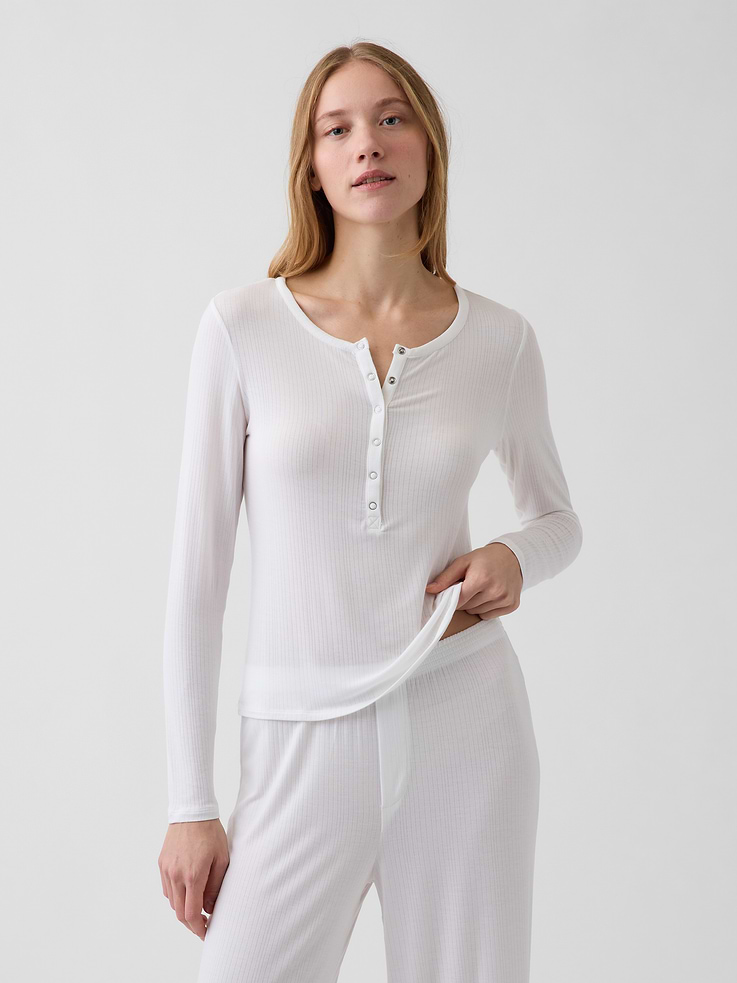 Image 1 of 5, Modal you’ll live in. Buttery soft. Naturally cool. In an ultra-fine rib. From your first layer to your last., Supersoft, subtly sheer, ribbed modal Henley pajama top., Crewneck with front button placket., Long sleeves., This product was made in a factory that invests in gender equity and women’s empowerment through RISE. Learn more at gapinc.com/equity ., Product #1190707