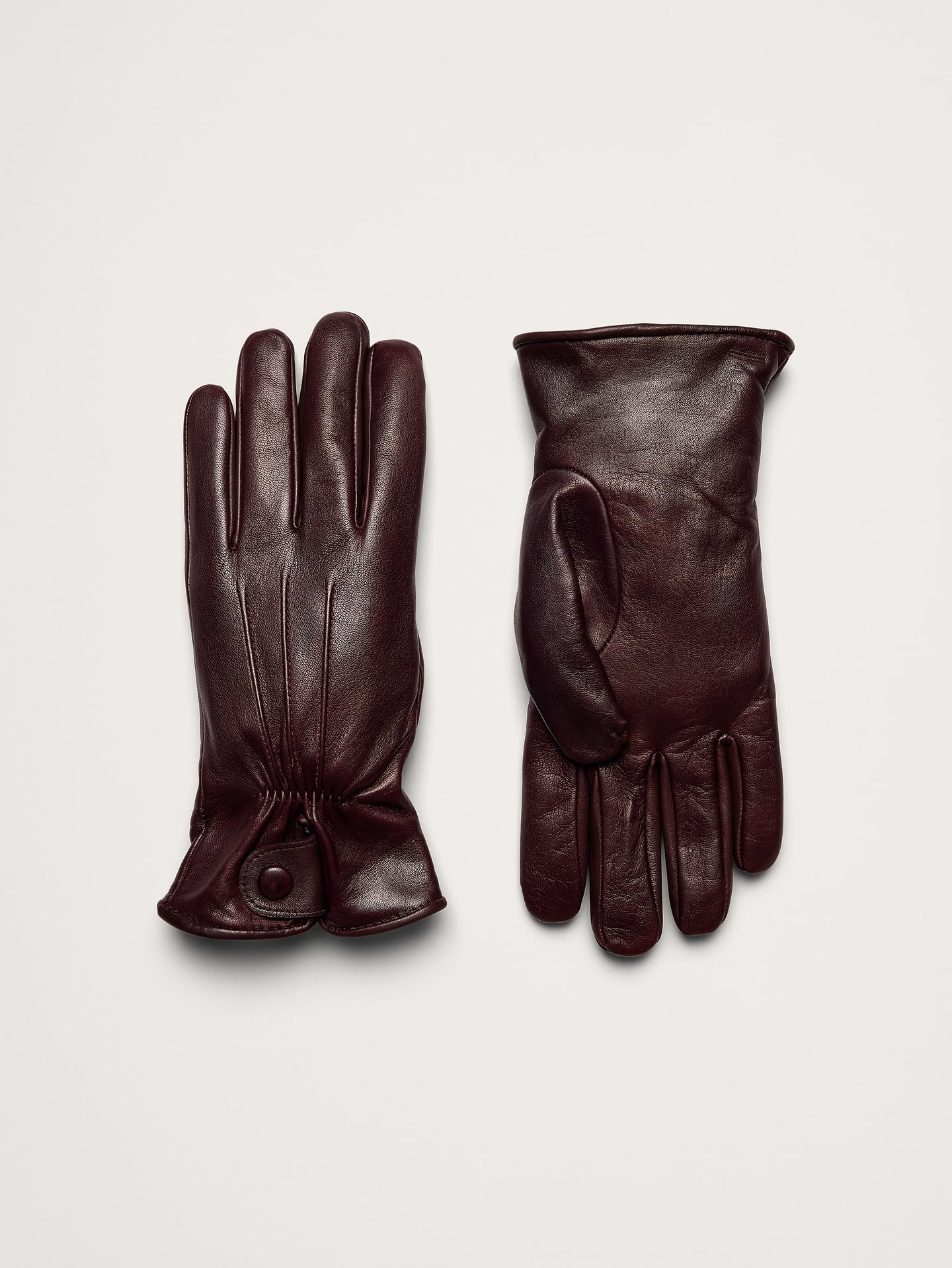 Image 1 of 2, You wont find another pair quite like this. Crafted in Italy from beautiful leather, we added beautiful pintuck detailing to the wrists and lined these timeless dress gloves with soft cashmere for added luxury., Fabric from Italy's Gianni Collini Srl., Product #906930