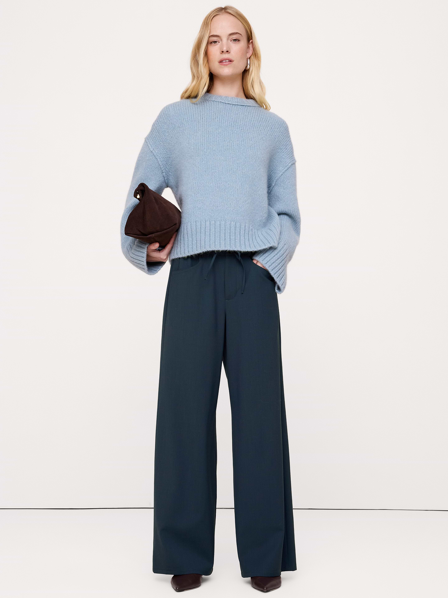 Image 1 of 8, Reach for these pants when you need to strike a balance between sharp tailoring and all-day comfort. We cut them from Italian wool with a touch of stretch for comfort.. Plus, we added elastic at the waist for a custom fit., Wide leg fit: Mid-rise with a straight fit through the thigh and wide leg. Full length., Fabric from Italy's Marzotto mill., Zip fly with button closure. Drawstring waist., Front and back pockets., Unlined., Product #1188384