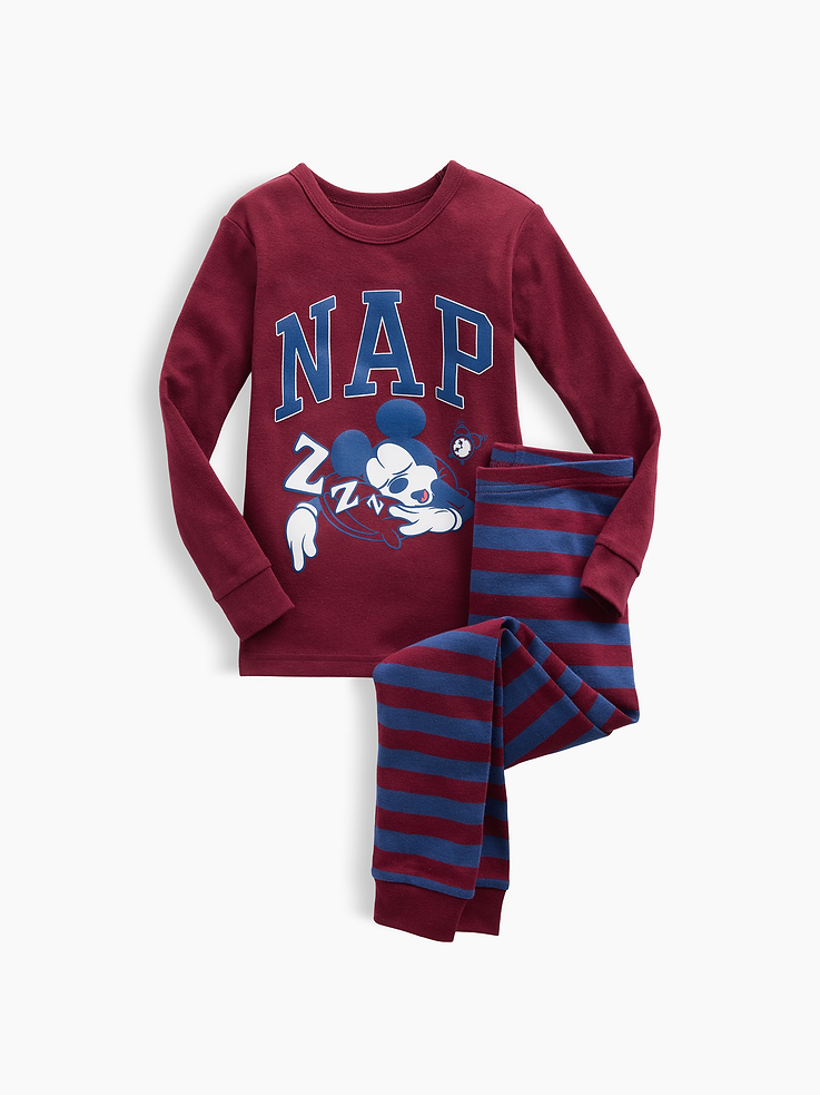 Image 1 of 2, A very special collaboration between Gap and Disney— two timeless, iconic American brands— led us to create a collection that celebrates Mickey Mouse and Minnie Mouse., Soft cotton knit., Long sleeves with banded cuffs., Crewneck., Mickey Mouse nap graphic at front., Elasticized waist., Banded cuffs., Allover stripes at pants., This product was made in a factory that invests in gender equity and women’s empowerment through RISE. Learn more at, Product #1185539