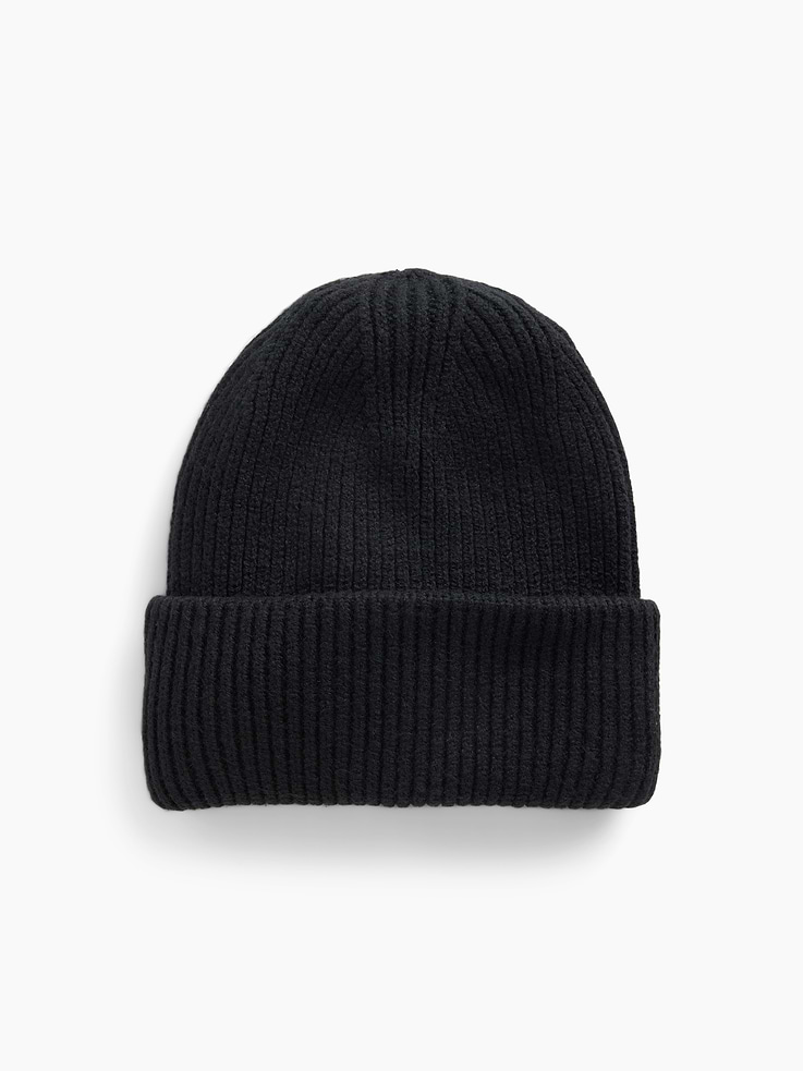Image 1 of 2, Our bestselling fabric that feels cashmere-soft. Crafted in a midweight plush yarn. Refined with a special brushed technique. It's everyday luxury., Supersoft ribbed knit beanie., Explore the Gap Gift Shop ., This product was made in a factory that invests in gender equity and women’s empowerment through RISE. Learn more at gapinc.com/equity ., Product #1184966