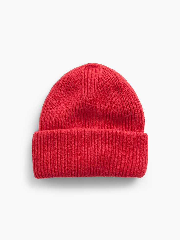 Image 1 of 2, Our bestselling fabric that feels cashmere-soft. Crafted in a midweight plush yarn. Refined with a special brushed technique. It's everyday luxury., Supersoft ribbed knit beanie., Explore the Gap Gift Shop ., This product was made in a factory that invests in gender equity and women’s empowerment through RISE. Learn more at gapinc.com/equity ., Product #1184966