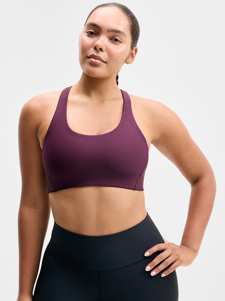 Image 1 of 4, BEST FOR CARDIO: run + train + HIIT, IMPACT: Medium-impact workouts, best for A-C cups, FEEL: PowerMove fabric is sleek, weightless, and helps keep you cool with quick-drying properties, FAVE: Dual cross-back straps and shaping seams for a secure, sculpted fit, Removable pads hold their shape from wash to wear, Lined with PowerMesh for breathable, sweat-proof coverage, Product #864108