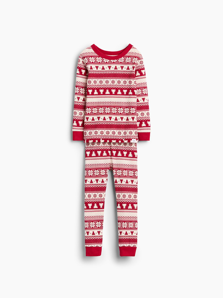Image 1 of 4, Our comfiest PJs—now softer than ever. Cozy brushed cotton on the inside. All their favorite prints & colors on the outside., Soft cotton pajama top and pants PJ set with a cozy brushed interior., Crewneck., Long sleeves., Elasticized waist at PJ pants., Banded cuffs., Allover print., Made with 100% organically grown cotton, which is grown without the use of synthetic pesticides and fertilizers., Note: Sizing for select prints extends up to 12 YRS for certain styles., Shop matching PJs for all., This product was made in a factory that invests in gender equity and women’s empowerment through RISE. Learn more at gapinc.com/equity ., Product #915908