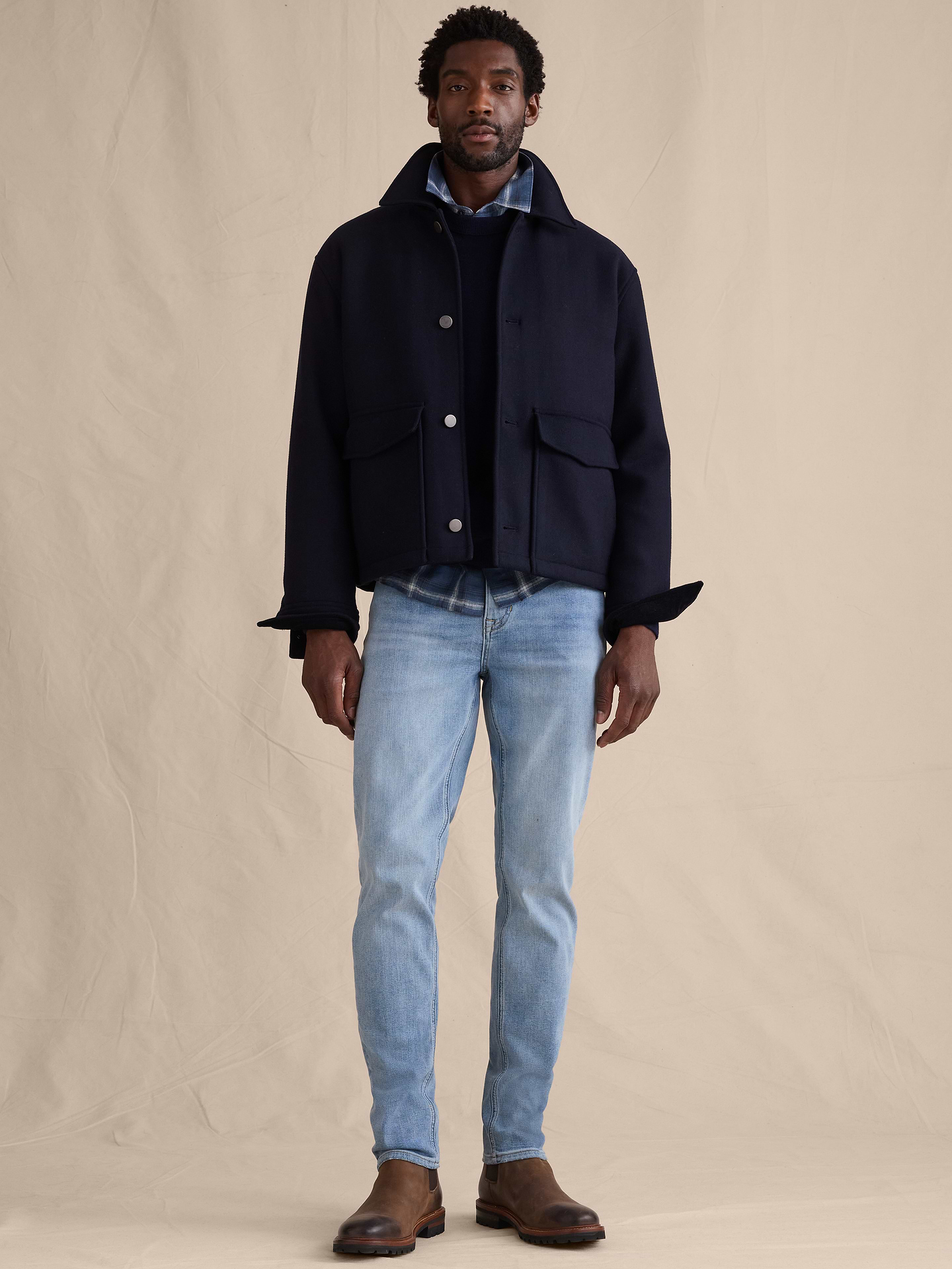 Image 1 of 8, Our Luxe Traveler Jean has an extra-fine weave and is engineered with added stretch for comfort., Slim Fit: Mid-rise (11"). Slim through thigh with a slim leg., Zip fly with button closure., Five pocket styling., Product #587812