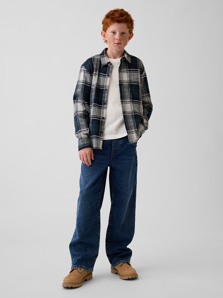 Image 1 of 6, Our most comfortable denim. With a super soft, knit handfeel. And a little stretch built in., Soft, stretch knit denim easy pull-on baggy jeans. In a relaxed fit., Elasticized waist with faux fly., Classic five-pocket styling., Dark wash., Responsibly Made: This pair of jeans is part of our water-saving Washwell program. Compared with conventional wash methods, Washwell uses at least 20% less water., More Sustainable Materials: Made with 15% recycled polyester and 5% recycled cotton. Compared to virgin materials, using recycled materials helps reduce resource use and waste., This product was made in a factory that invests in gender equity and women’s empowerment through RISE. Learn more at gapinc.com/equity ., Product #1184353
