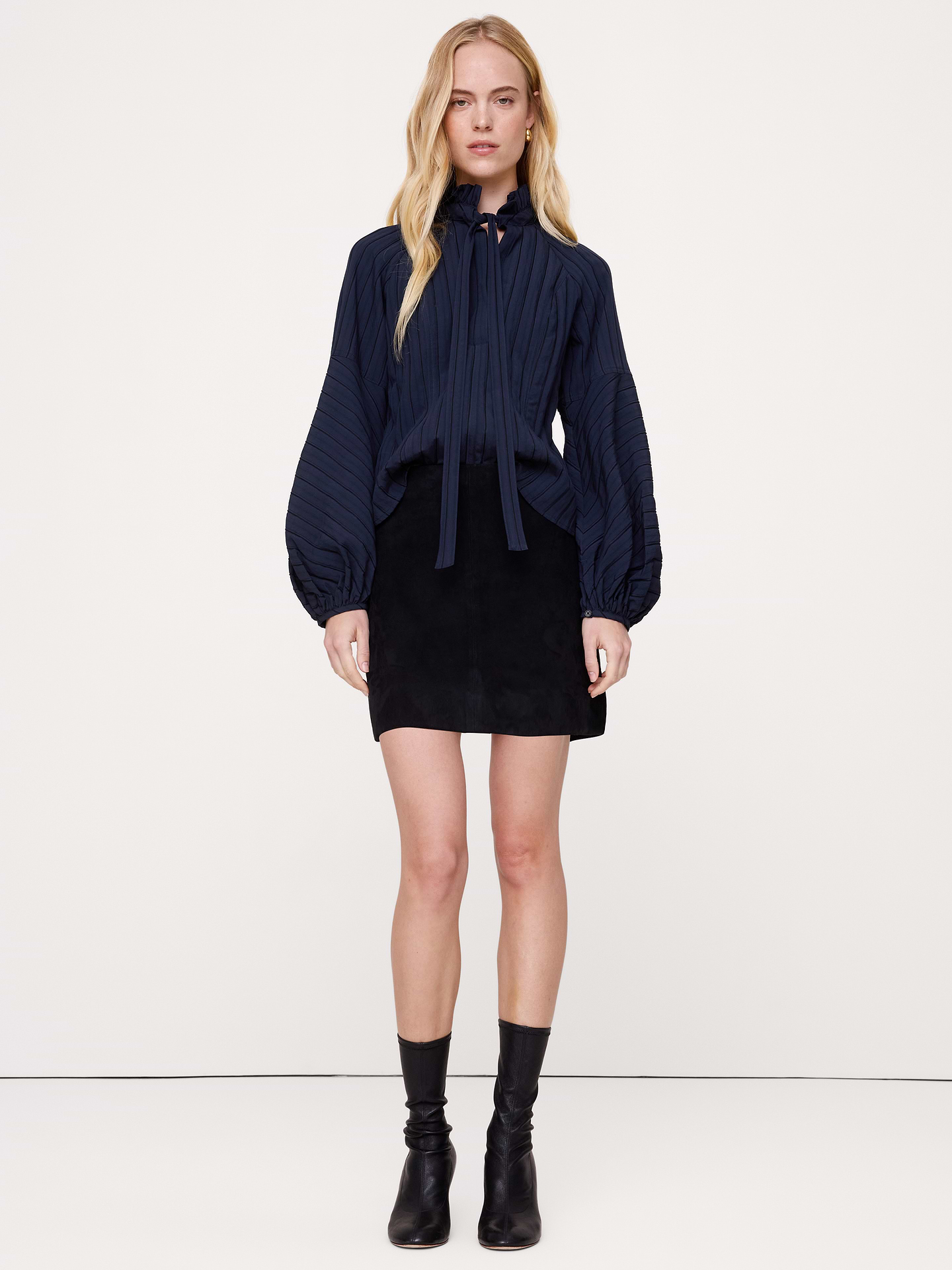 Image 1 of 7, An easy peasant top with a twist. We added ruffles and a tassel tie to the neckline of this flowy shirt., Relaxed Fit: A straight & roomy fit., V-neck with tie closure., Straight hem., Product #1186890