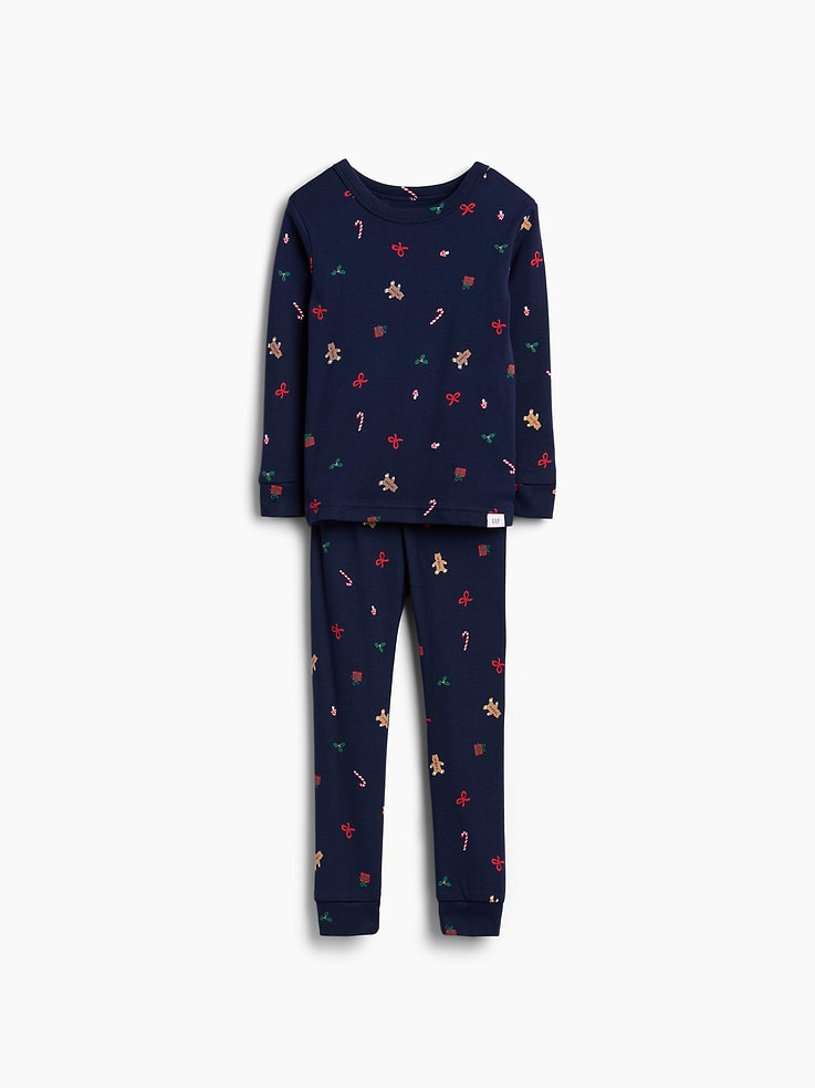 Image 1 of 4, Our comfiest PJs—now softer than ever. Cozy brushed cotton on the inside. All their favorite prints & colors on the outside., Soft cotton pajama top and pants PJ set with a cozy brushed interior., Crewneck., Long sleeves., Elasticized waist at PJ pants., Banded cuffs., Allover print., Made with 100% organically grown cotton, which is grown without the use of synthetic pesticides and fertilizers., Note: Sizing for select prints extends up to 12 YRS for certain styles., Shop matching PJs for all., This product was made in a factory that invests in gender equity and women’s empowerment through RISE. Learn more at gapinc.com/equity ., Product #915908