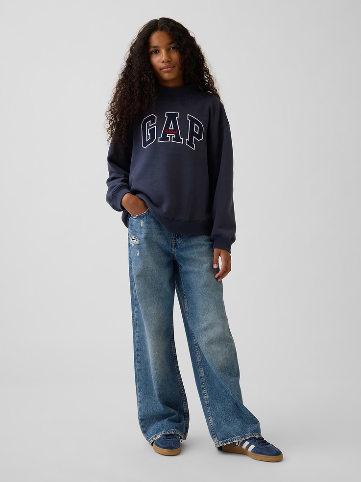 Image 1 of 5, Authentic, no stretch denim jeans., Button at center (sizes 4-8 have a hook & bar closure beneath faux snap for easy on and off), zip fly., Classic 5-pocket styling., Medium denim wash with fading and whiskering., Responsibly Made: This pair of jeans is made with 5% recycled cotton and is part of our Washwell program, which uses at least 20% less water as compared with conventional wash methods. We’ve saved over a billion liters of water through Washwell since 2016., This product was made in a factory that invests in gender equality and women’s empowerment. Through RISE (Reimagining Industry to Support Equality) and Gap Inc.’s program P.A.C.E. (Personal Advancement & Career Enhancement), we support people who make our clothes to build the skills, knowledge, confidence, and resilience needed to advance in work and life. Learn more here ., Product #501265