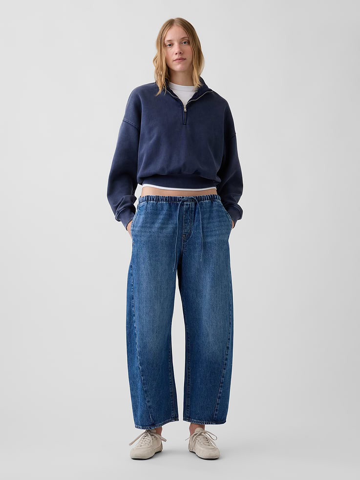 Image 1 of 6, The softest denim ever made. Our exclusive, ultra-light Tencel™ blend with an easy drape for year-round wears., Fit: A full-length barrel jean that's fitted at the waist with a relaxed leg and tapered ankle., Fabric: 60% Cotton, 40% Lyocell Lenzing TENCEL., Stretch: No Stretch Jeans. Authentic denim that gets better with every wear. Made to wear all day & break in over time., Rise: Mid Rise Jeans., Look: An easy barrel jean in a medium indigo wash., Details: Drawcords at elasticized waist & four-pocket styling., Responsibly Made: This pair of jeans is part of our water-saving Washwell program. Compared with conventional wash methods, Washwell uses at least 20% less water., Explore our GapJeans Guide ., Product #1190729