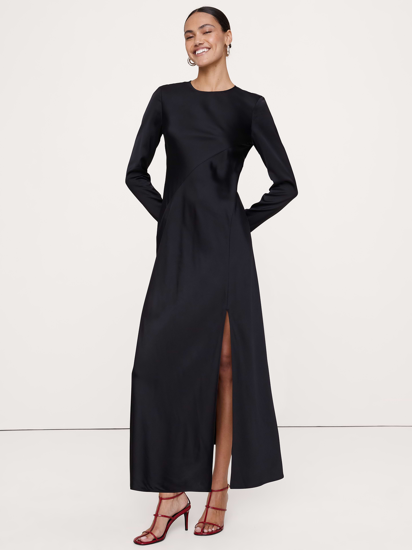 Image 1 of 8, It takes an expert hand to cut satin on the bias, but we just love the way it drapes. With this maxi dress, we put our skills to the test to showcase a silhouette that you can easily dress up or down., Sheath Fit: Slim. Sits close to the body with a flare skirt. Maxi length., Crew neck with invisible zip closure at back. Bra-friendly., Slit at the wearer's left., Unlined., *This style runs large. If you're between sizes, size down., Product #1180342