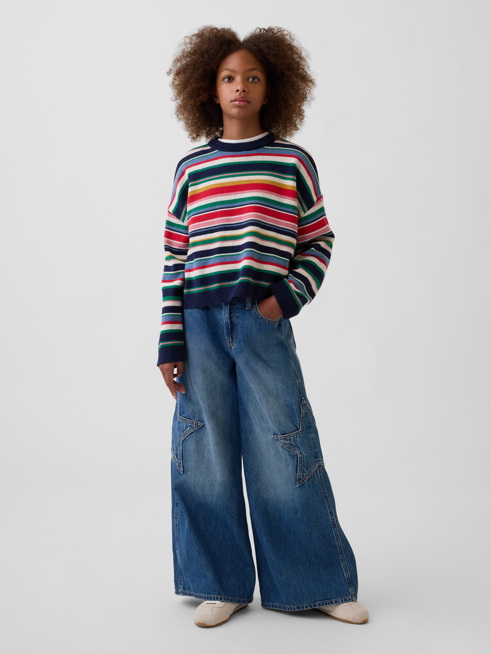Image 1 of 6, Authentic, non-stretch denim baggy wide-leg jeans. In a relaxed fit and low rise., Button closure at adjustable waist (sizes 4-8 have a hook & bar closure beneath faux snap for easy on and off), zip fly., Classic five-pocket styling., Inset star detail at sides., Dark wash., Responsibly Made: This pair of jeans is part of our water-saving Washwell program. Compared with conventional wash methods, Washwell uses at least 20% less water., Made with 52% Protocol cotton verified by the U.S. Cotton Trust Protocol, a program which works with farms committed to improving their environmental footprint by minimizing water usage and improving soil health (Claim No. 10127)., Made with 5% recycled cotton. Compared to virgin materials, using recycled materials helps reduce resource use and waste., This product was made in a factory that invests in gender equity and women’s empowerment through RISE. Learn more at gapinc.com/equity ., Product #1184958