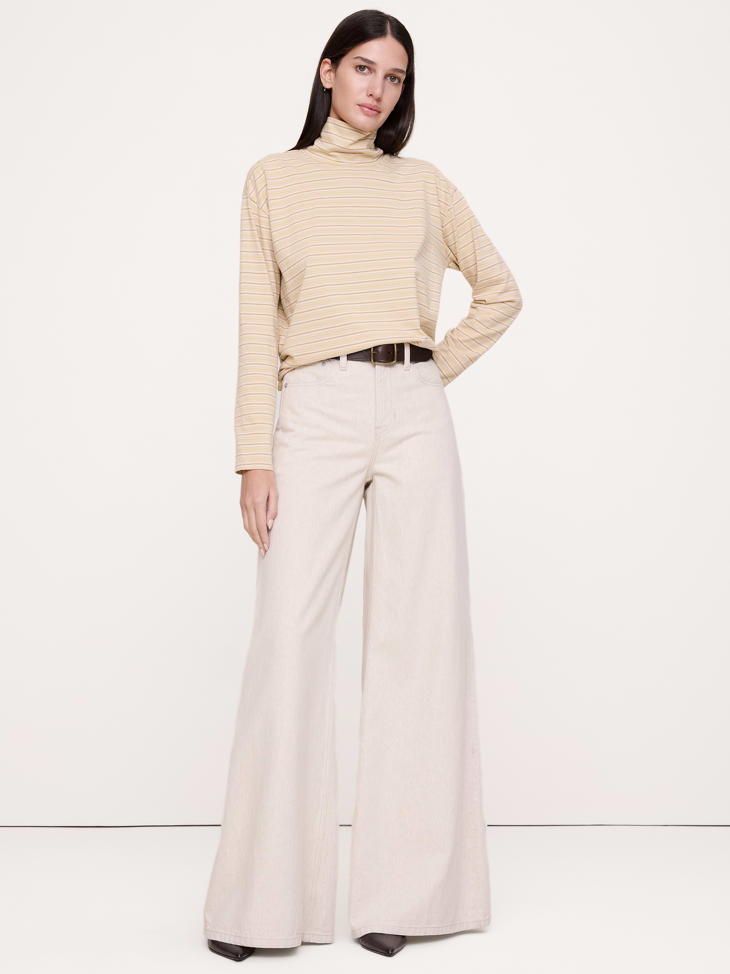 Image 1 of 3, One of our best tees to date, we cut this one with a roomy fit and funnel neck, crafted in a midweight cotton we love for its vintage-like softness., Oversized Fit: Extra room through chest, shoulders, and waist. Dropped shoulder seam., Funnel neck., Straight hem., Product #1183323