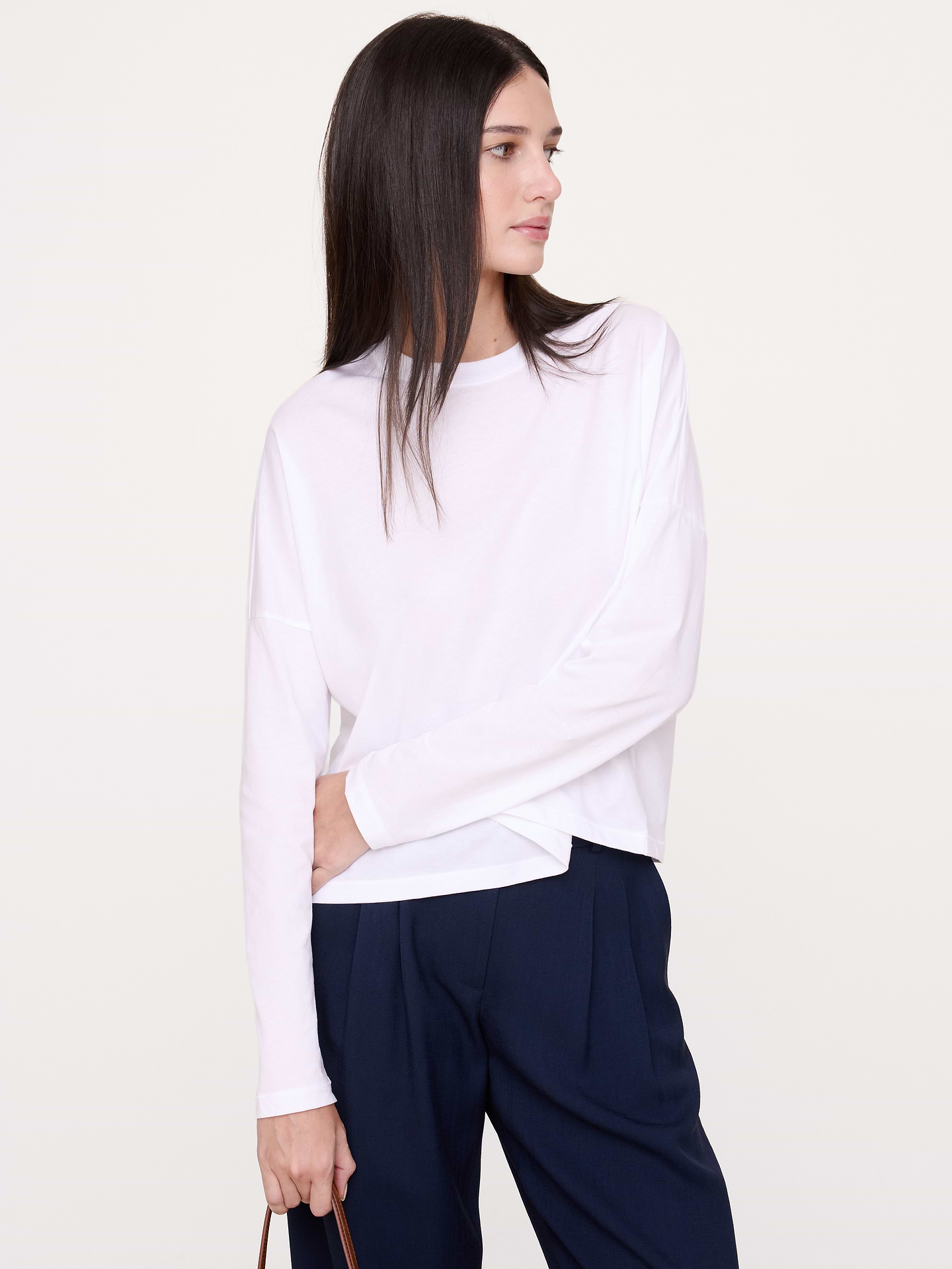 Image 1 of 3, Our team's favorite new tee. Here's why: this boxy version is cut from lightweight jersey that's incredibly soft. We kept the fit roomy, added tapered sleeves, and a slightly shorter hem., Boxy Fit: A relaxed and easy fit through shoulders, chest, and waist. Tapered sleeve. Cropped., Crew neck., Straight hem., Product #1197782