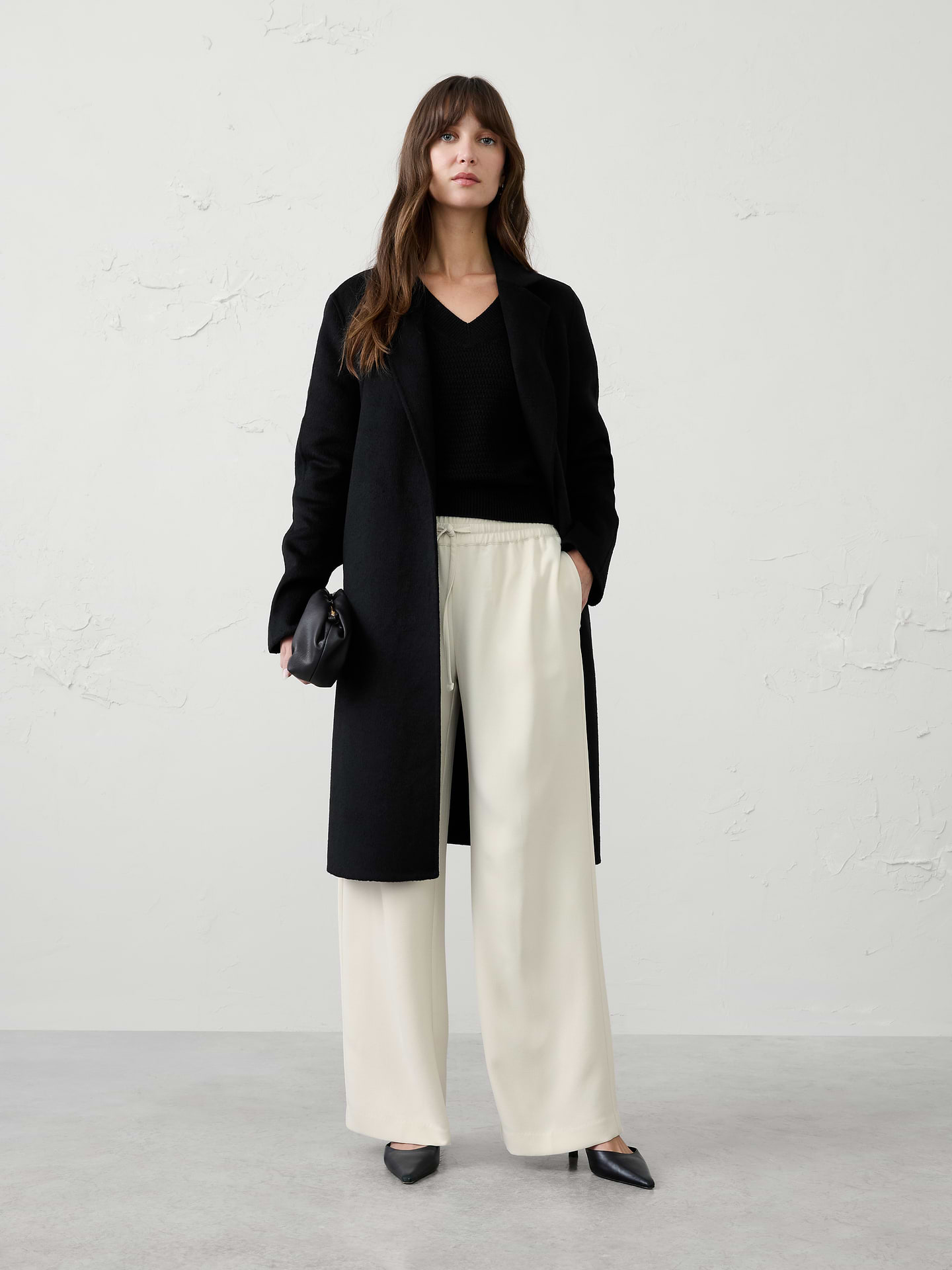 Image 1 of 6, The perfect blend of comfort and polish, this pull-on crepe pant is designed for effortless everyday versatility. Crafted from a fluid crepe fabric, it features a flattering mid-rise fit and a clean silhouette that transitions seamlessly from work to weekend. Whether dressed up with a blazer or styled casually with a knit top, this pant is a go-to staple for any occasion., SUSTAINABILITY: Made with 100% recycled polyester., Pull-on pant. Adjustable drawstring waistband., On-seam side pockets., Back welt pockets., Soft trouser crease., Made exclusively for Banana Republic Factory., Product #1182227