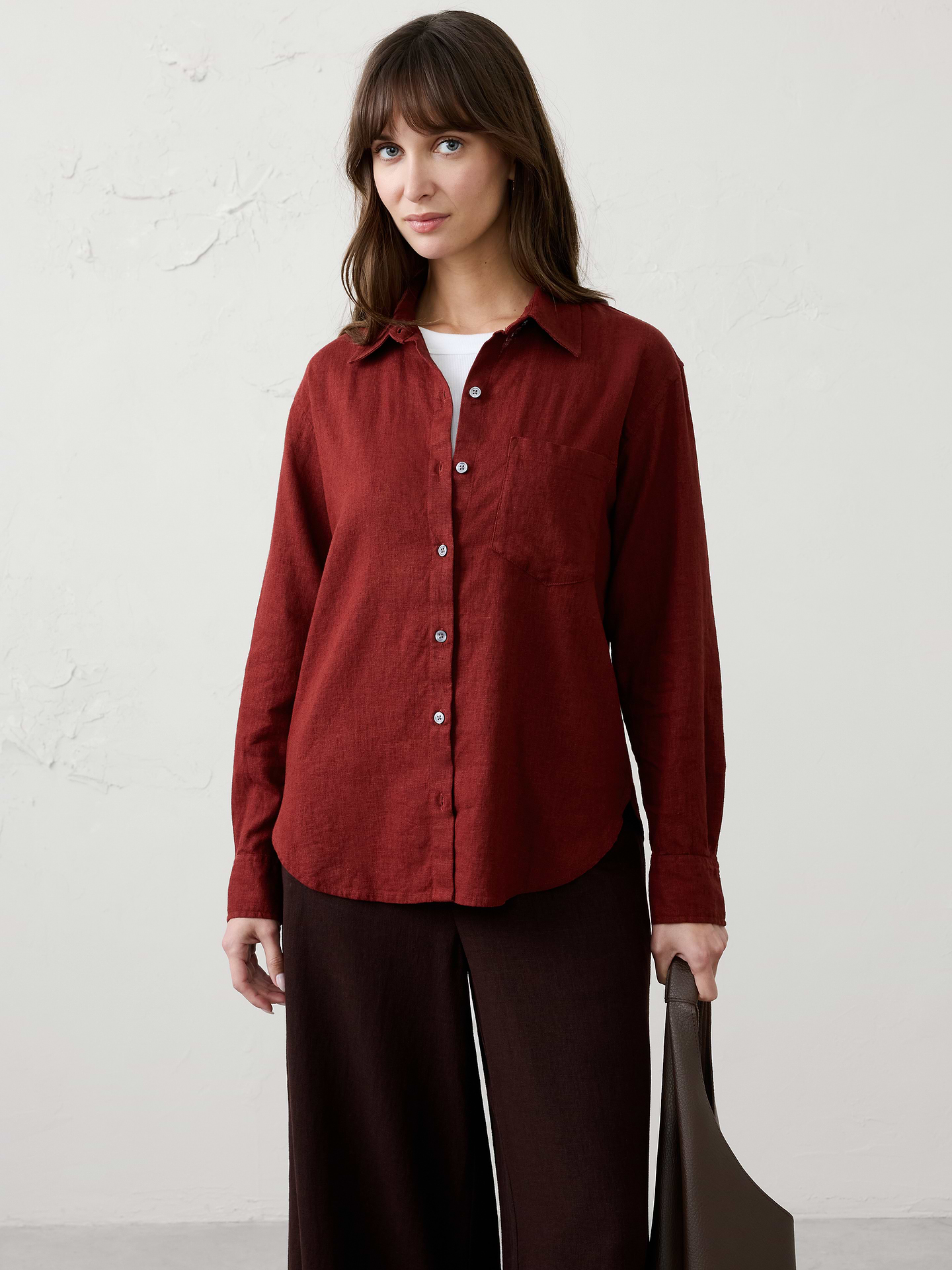 Image 1 of 4, Classic linen-blend shirt, light and breathable—perfect for layering., Stand collar. Long sleeves with buttoned cuffs., Button front closure., Chest pocket., Back yoke with box pleat., High-low shirttail hem., Made exclusively for Banana Republic Factory., Product #1180324