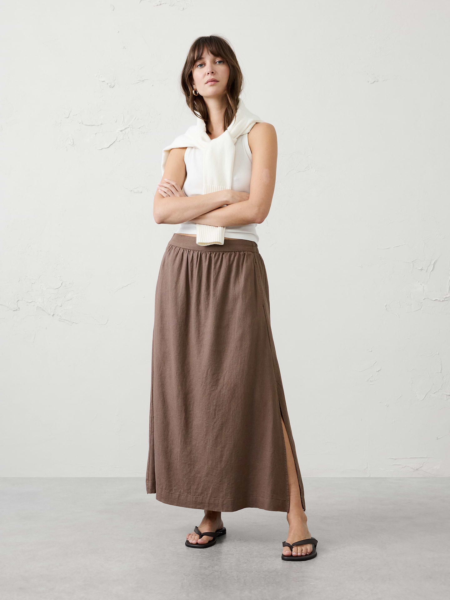 Image 1 of 4, Easy, breezy, and endlessly versatile, our skirt is designed for warm-weather dressing. Crafted from a soft, drapey linen blend, it offers effortless movement and a lightweight feel that's perfect for sunny days., LINEN-BLEND: This light and breathable fabric is a must for those warm days and styles effortlessly for all occasions., Pull on skirt., Gathering below the waistband., Side pockets., Elasticized back waistband., Single side slit., Fully lined., Made exclusively for Banana Republic Factory., Product #1185772