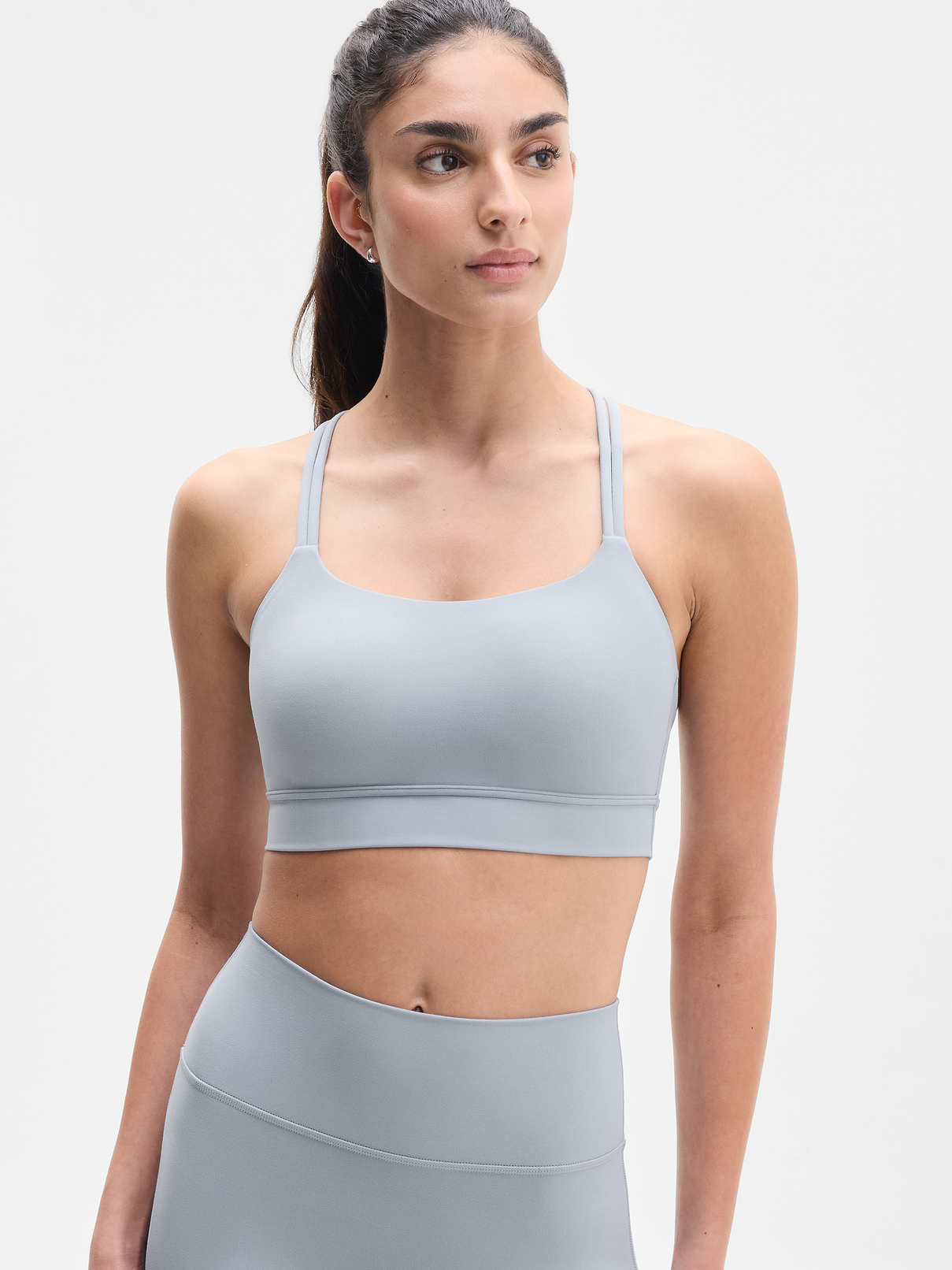 Image 1 of 3, BEST FOR STUDIO: yoga + barre + pilates, IMPACT: Light-impact workouts, best for A-C cups, FEEL: VitaFree fabric with enhanced LYCRA® fiber is our lightest-feel yoga fabric for a barely there, yet fully covered sensation, FAVE: Lined with flexible foam, shaped for smoothing support, Sewn-in foam layer stays put from first breath to final stretch, Lattice-like straps give understated edge, Product #626672