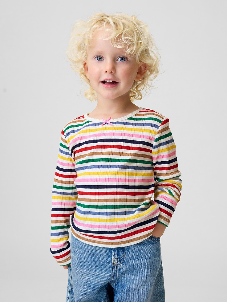 Image 1 of 4, Soft, ribbed pointelle-knit T-shirt., Round neckline with scalloped edge and tacked satin ribbon bow., Long sleeves., Product #1183552