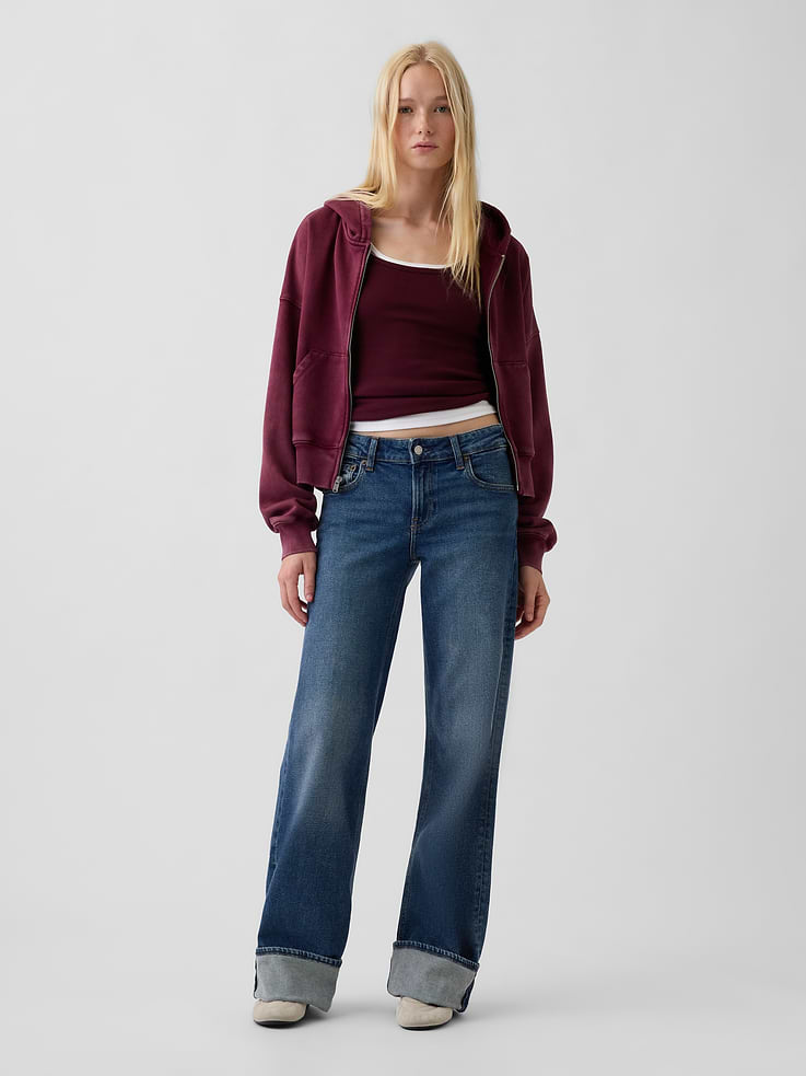 Image 1 of 5, Fit: Low slung & loose in the hip & thigh. With a relaxed wide leg, easy fit & full-length cut.​, Fabric: 99% Cotton, 1% Stretch., Stretch: Low Stretch Jeans. Authentic denim with a soft & easy lived-in feel.​, Rise: Low Rise Jeans., Look: A five-pocket wide-leg jean in a medium wash., Details: Zip fly, five-pocket styling, & cuffed hem., This jean is part of our water-saving Washwell program. Compared with conventional wash methods, Washwell uses at least 20% less water., Made with 50% Protocol cotton verified by the U.S. Cotton Trust Protocol, a program which works with farms committed to improving their environmental footprint by minimizing water usage and improving soil health (Claim No. 10127)., Made with 5% recycled cotton. Compared to virgin materials, using recycled materials helps reduce resource use and waste., Product #1185251