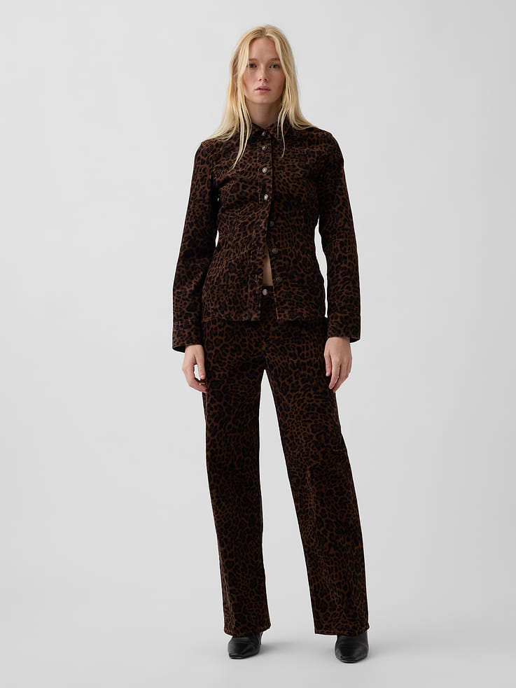Image 1 of 7, Fit: A full-length loose pant that's fitted on the waist & relaxed all the way down., Fabric: 80% Cotton, 18% Viscose Rayon, 2% Elastane., Stretch: Low Stretch Pants., Rise: Low Rise Pants., Look: A classic, loose corduroy pant with an allover leopard print., Details: Zip fly & classic five-pocket styling., This product was made in a factory that invests in gender equity and women’s empowerment through RISE. Learn more at gapinc.com/equity ., Product #1185261