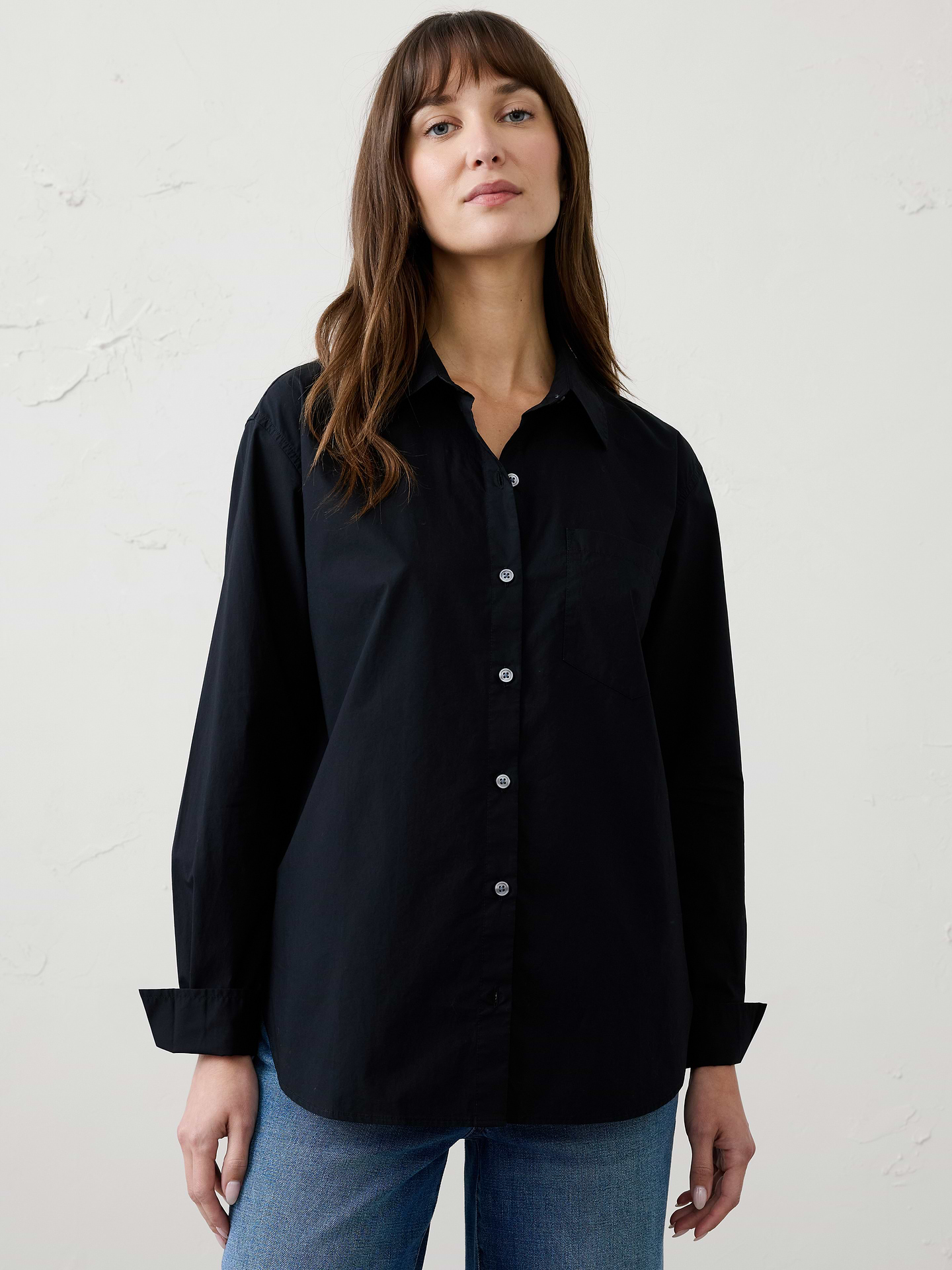 Image 1 of 8, Stand collar. Long sleeves with buttoned cuffs., Button front closure., Chest pocket., Back yoke with box pleat., High-low shirttail hem., Made exclusively for Banana Republic Factory., Product #1173409
