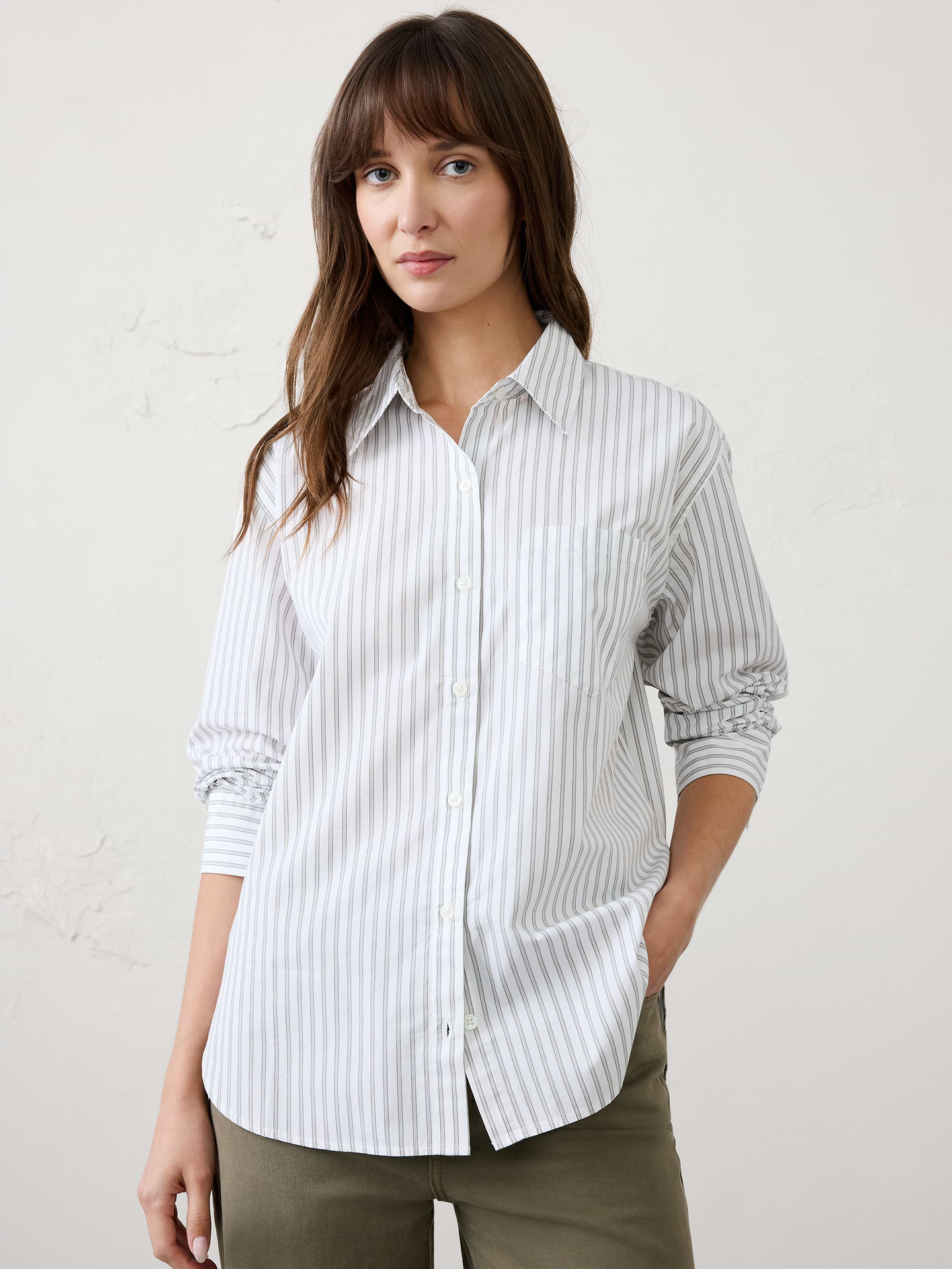 Image 1 of 8, Stand collar. Long sleeves with buttoned cuffs., Button front closure., Chest pocket., Back yoke with box pleat., High-low shirttail hem., Made exclusively for Banana Republic Factory., Product #1173409