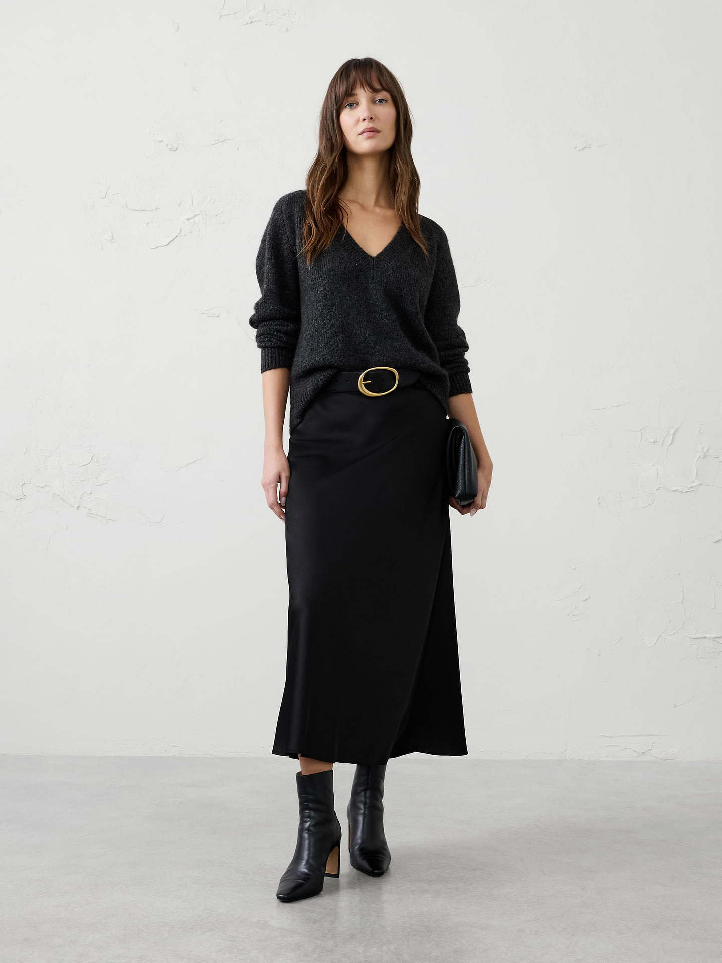 Image 1 of 4, Our best‑selling satin slip skirt is a timeless wardrobe essential, designed with a fluid silhouette and effortless drape. Elegant yet versatile, it’s the perfect piece for occasion dressing, easily styled up for special events or down for a more relaxed, polished look., Pull on skirt., Bias‑cut satin fabrication enhances fluid drape and movement., Flared hem creates a soft, flowing silhouette., Made exclusively for Banana Republic Factory., Product #1185762