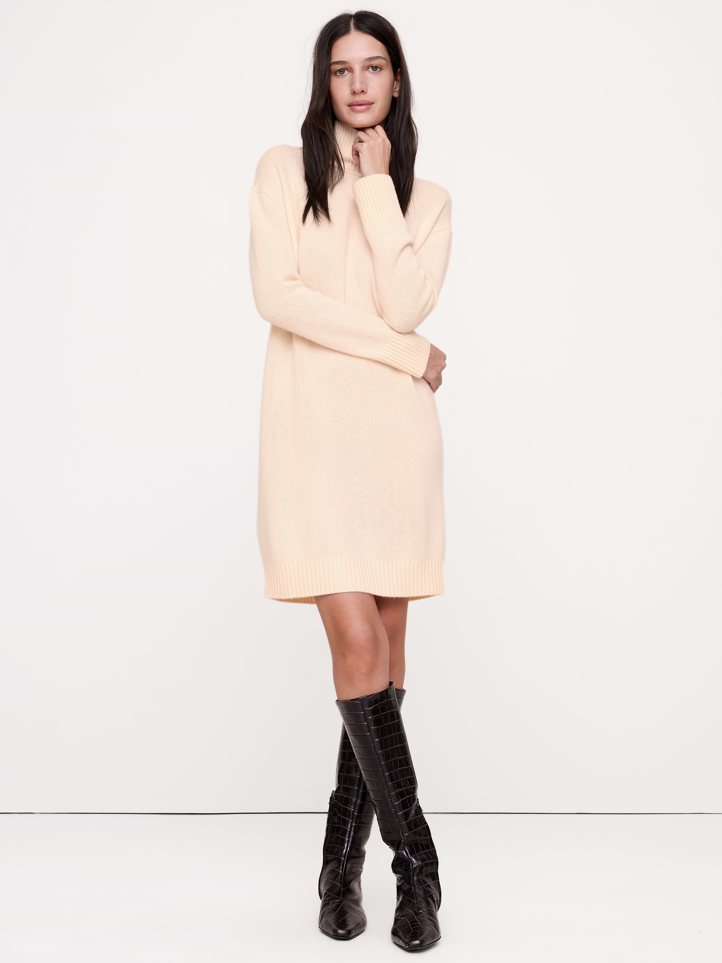 Image 1 of 8, The vibe is lightweight luxury. This cashmere sweater dress has a relaxed fit, knitted in our lightweight cashmere yarn—selected for its softness and all-season weight., Shift fit: Relaxed shoulders, straight through bust, waist and hip with a straight skirt., Turtleneck., Pull-on design., Unlined., Product #1182095
