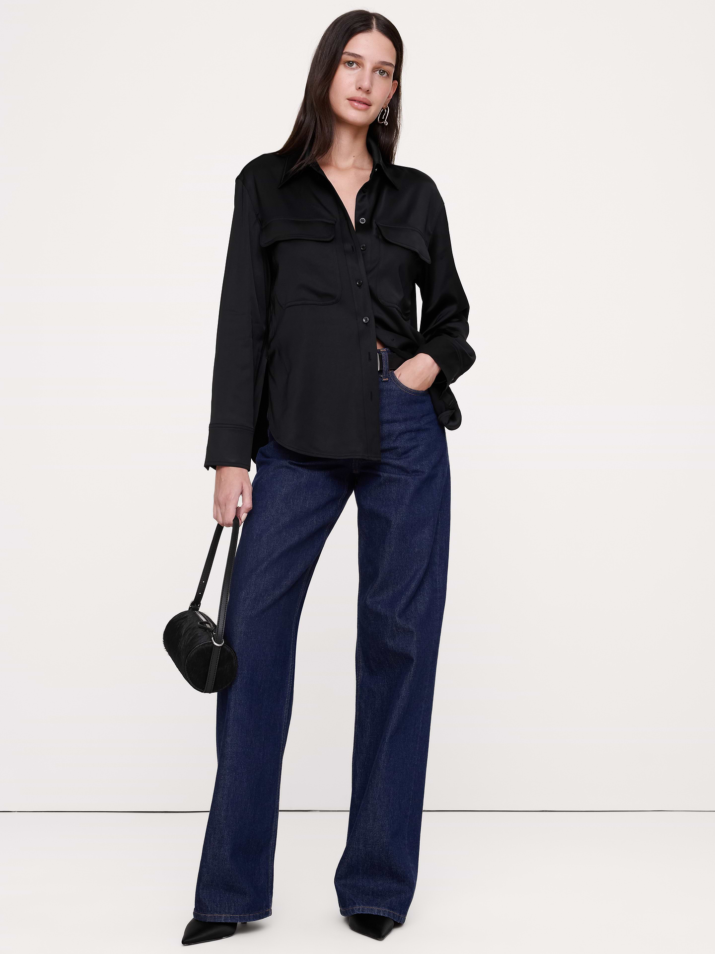 Image 1 of 8, An exploration of luxe utility, this oversized shirt has chest pockets for a utilitarian twist on the classic button-down shirt. Cut in a beautiful stretch-satin fabric., Oversized fit: Extra room through chest, shoulders, and waist. Dropped shoulder seams., Point collar with button front., Chest pockets., Shirttail hem., Product #1183797