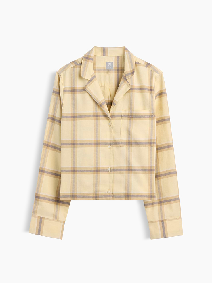 Image 1 of 3, Soft flannel cotton button-up pajama shirt. In a relaxed fit and cropped length., Notch collar, button front., Chest patch pocket., Straight hem., Allover plaid., This product was made in a factory that invests in gender equity and women’s empowerment through RISE. Learn more at gapinc.com/equity ., Product #1186854