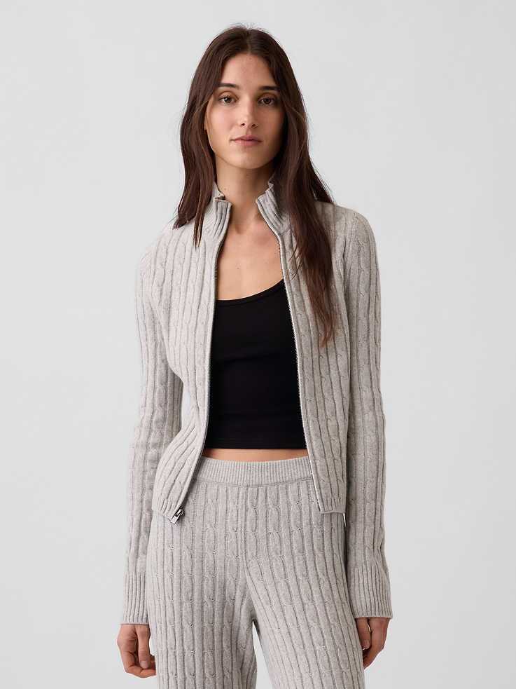 Image 1 of 5, Supersoft cable-knit cotton-blend zip cardigan., Mockneck, zipper front., Long sleeves., Ribbed cuffs and hem., Explore the Gap Gift Shop ., This product was made in a factory that invests in gender equity and women’s empowerment through RISE. Learn more at gapinc.com/equity ., Product #1186083