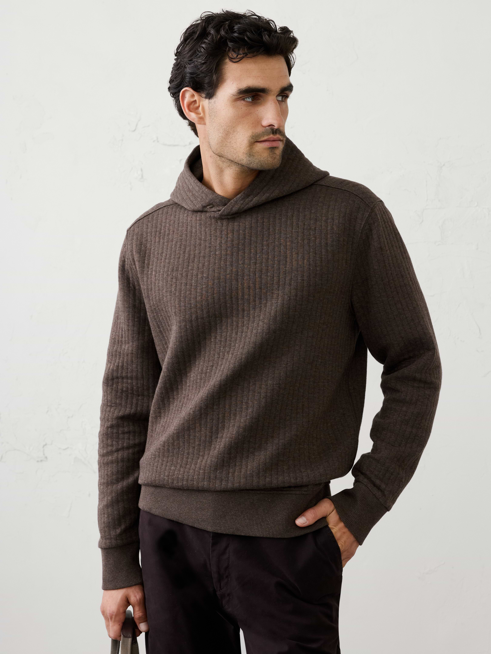 Image 1 of 3, Crafted from a soft quilted fabric, this hoodie delivers lightweight warmth with a textured, elevated look. Designed for easy layering, it offers all‑day comfort and versatility., Hooded. Long sleeves., Ribbed arm cuffs and hem., Made exclusively for Banana Republic Factory., Product #1181075