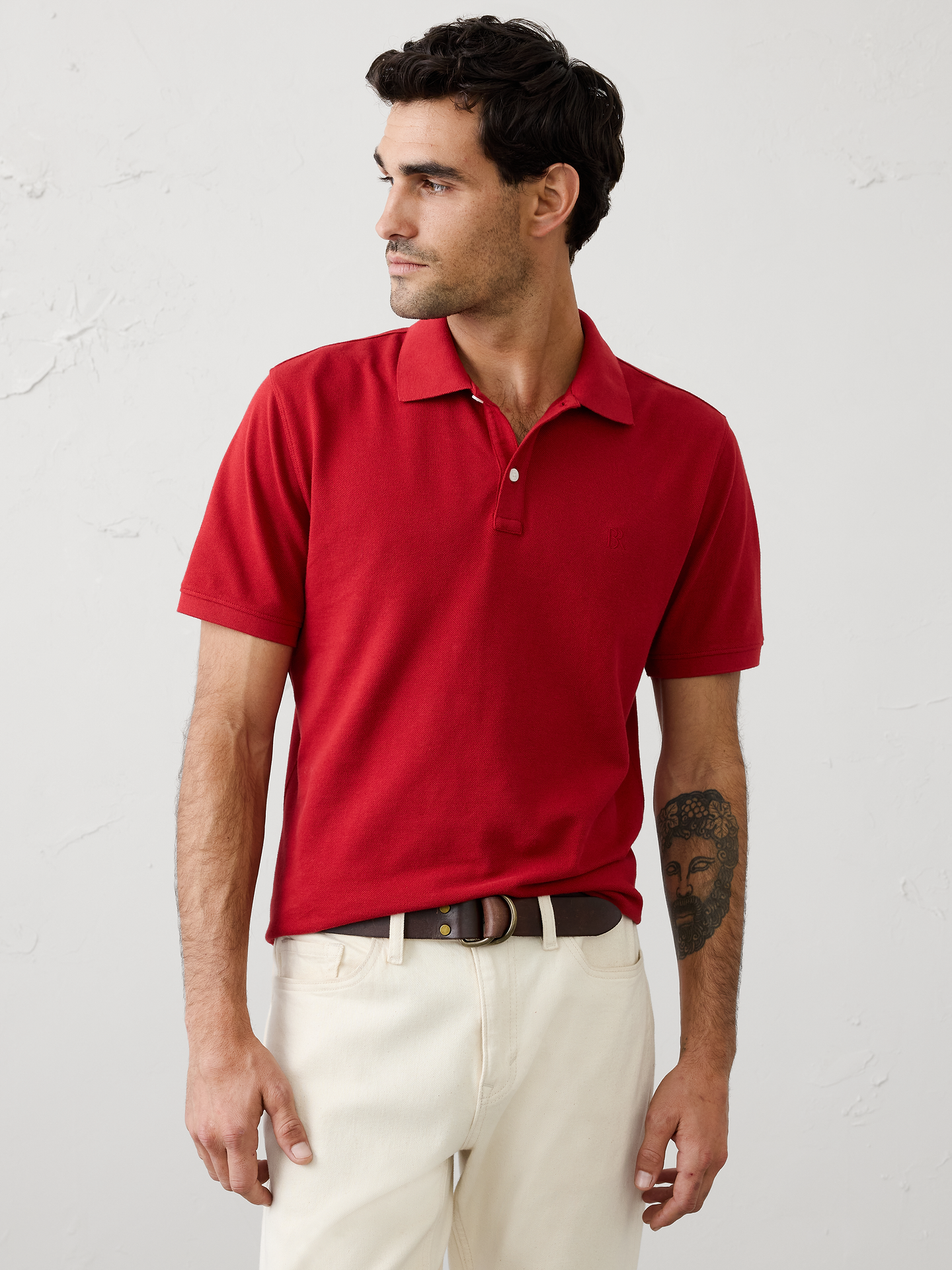Image 1 of 8, Polo collar with button placket. Short sleeves., Embroidered monogram on chest., Straight hem with side vents., Made exclusively for Banana Republic Factory., Product #719664