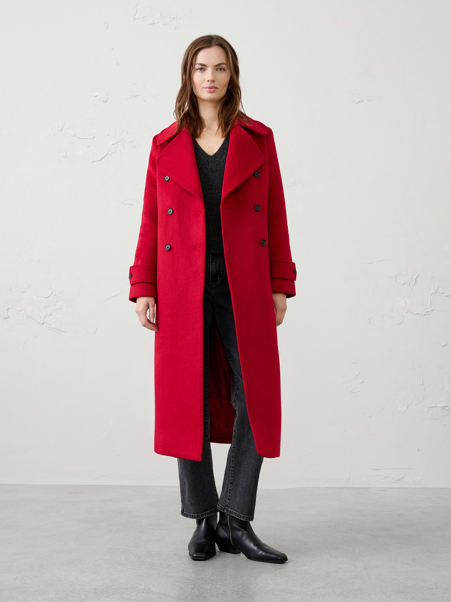 Image 1 of 4, Make a statement in timeless outerwear with this double-breasted coat, expertly tailored for a polished and sophisticated look. Designed with a longline silhouette, wide notch lapels, and a classic double-breasted button front, this coat delivers enduring style season after season., Wide notch lapel collar. Long sleeves with button cuff tab detailing., Double-breasted button-front closure., Front vertical buttoned flap pockets., Center back vent., Fully lined., Made exclusively for Banana Republic Factory., Product #1178060