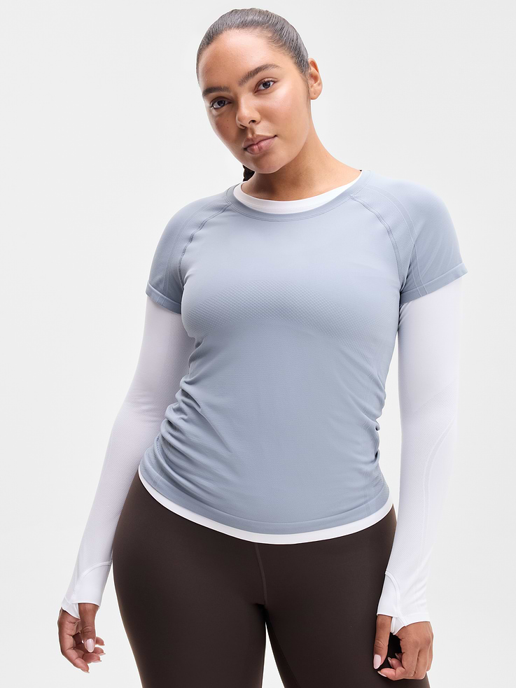 Image 1 of 5, FOR: Medium to high-impact workouts at the gym, studio, or outdoors, FEEL: Enhanced yarns deliver soft stretch and quick recovery, keeping you comfortable while you push your limits, FAVE: The workout top you love, now with upgraded stretch, sweat-wicking power, and sleek style, Seamless construction for minimal chafing, Functional mesh panels allow for optimal movement and breathability, Grippers at inner hem prevent it riding up, Product #845692